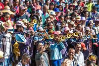 The dancing crowd gets a trumpet salute