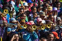 The dancing crowd gets a trumpet salute