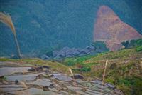 rijstterrassen van Longji, landslide in achtergrond